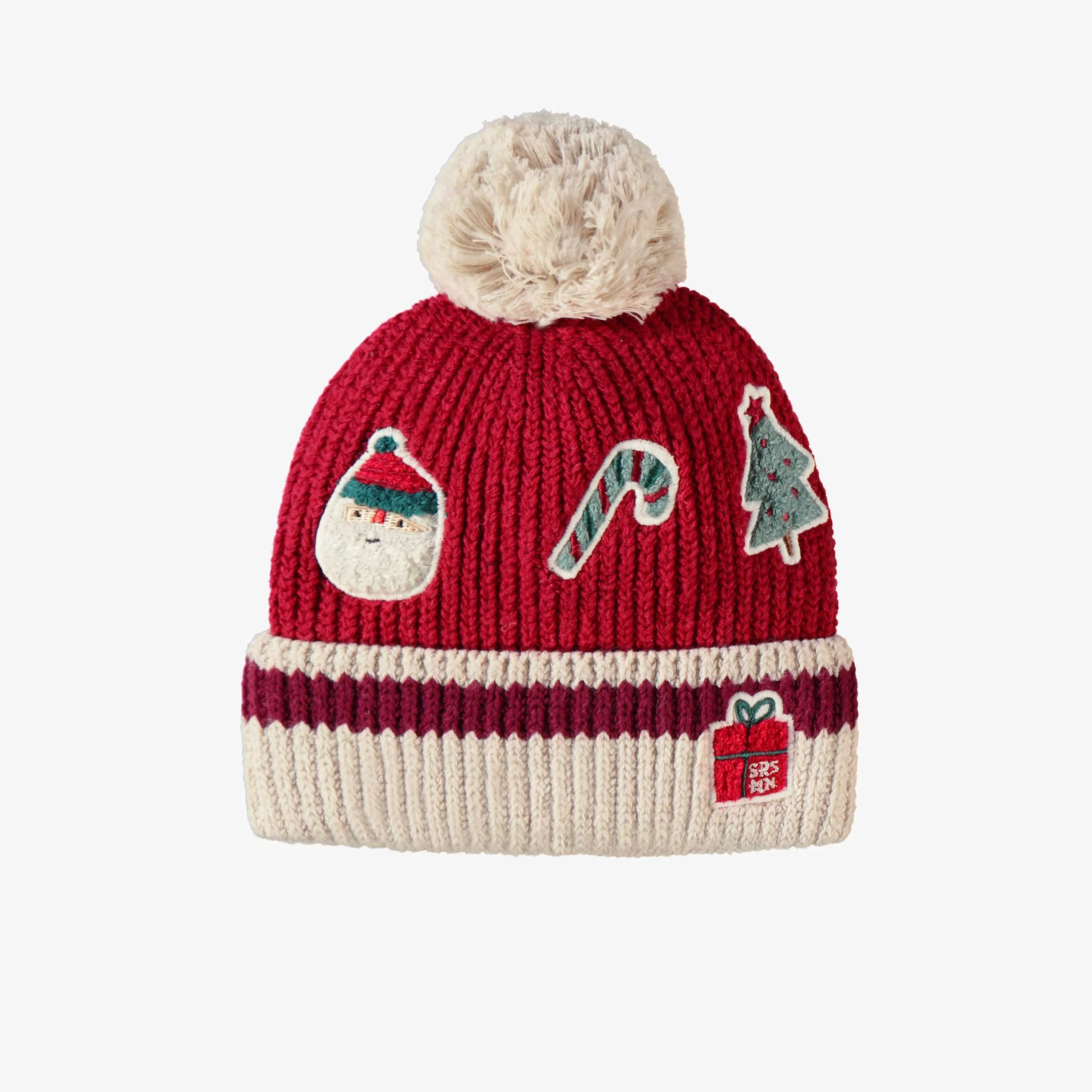 Tuque rouge en tricot avec motifs des Fêtes, bébé